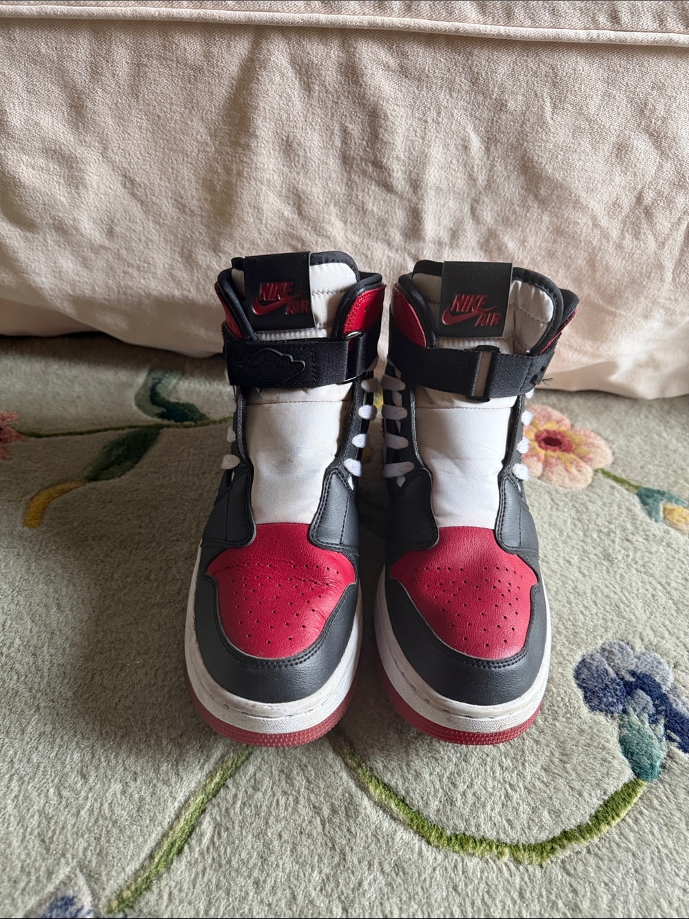 Woman Nike Air Jordan 1 high top trainers #sneakers #jordan